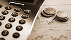alt=Calculator and stock report