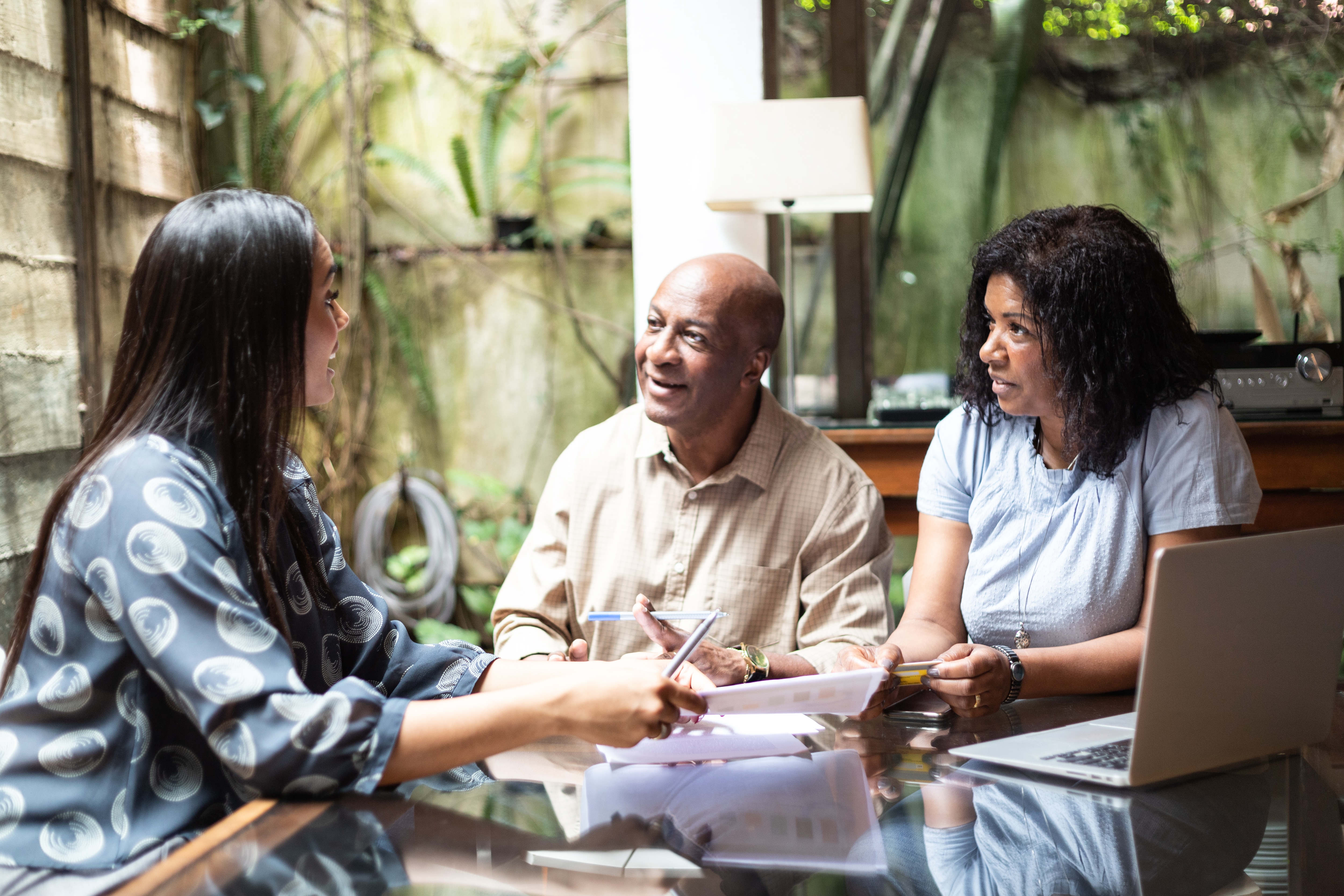 Consultant giving advices to the family at home