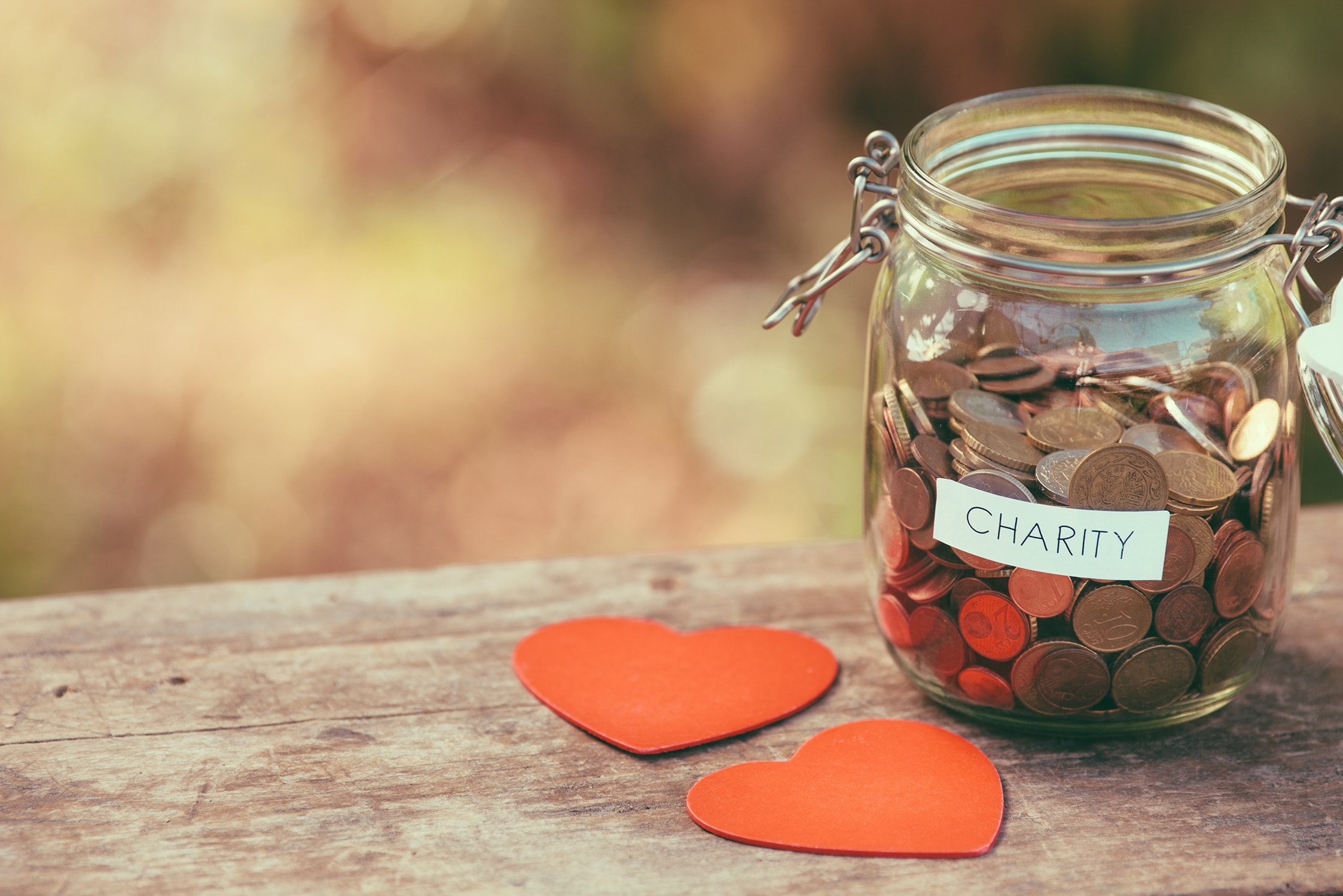 Image of jar of coins for charity