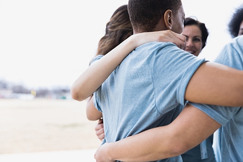 Team interlocking arms