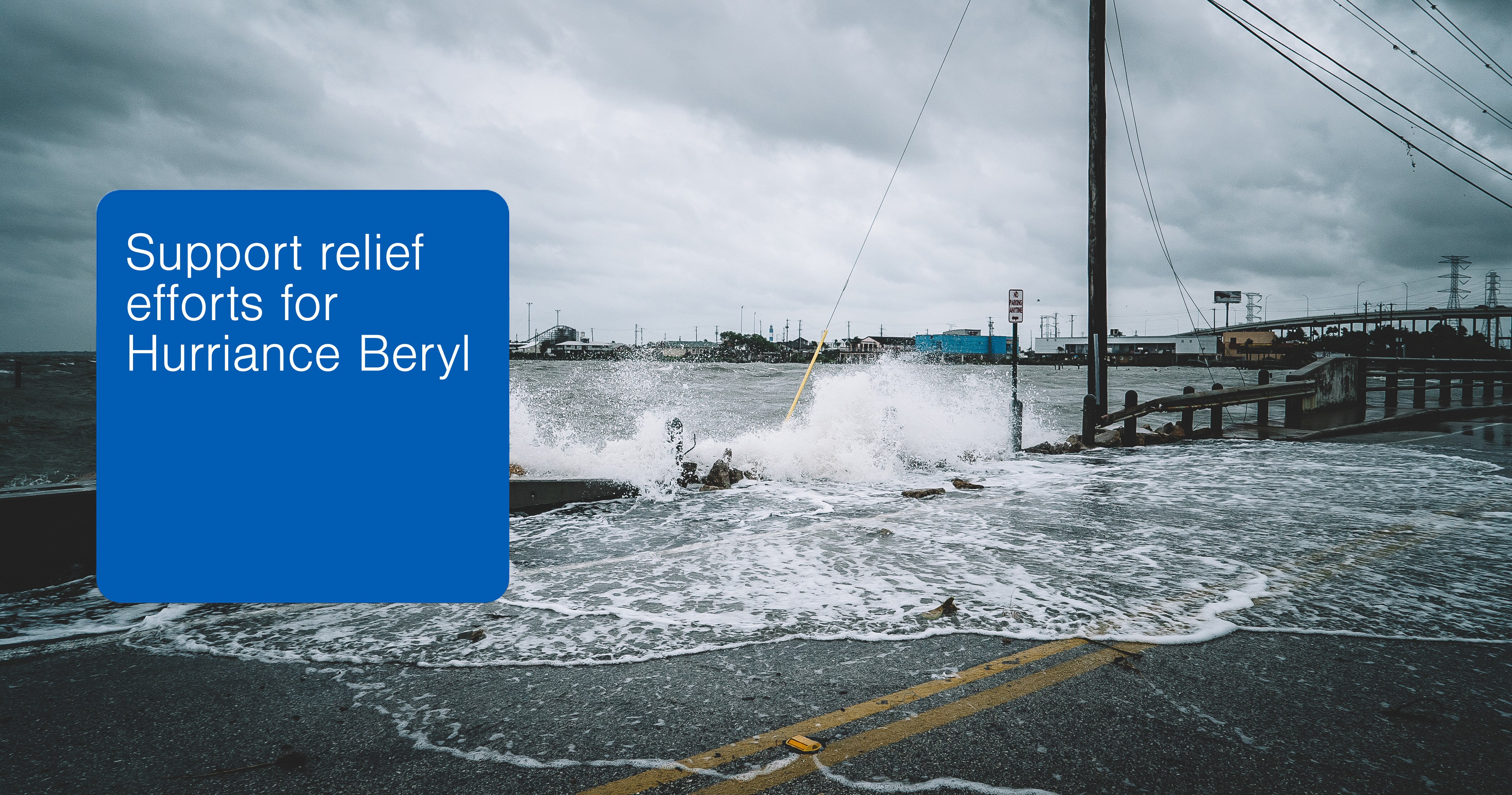 Flooded streets with blue box containing text saying support relief efforts for Hurricane Beryl