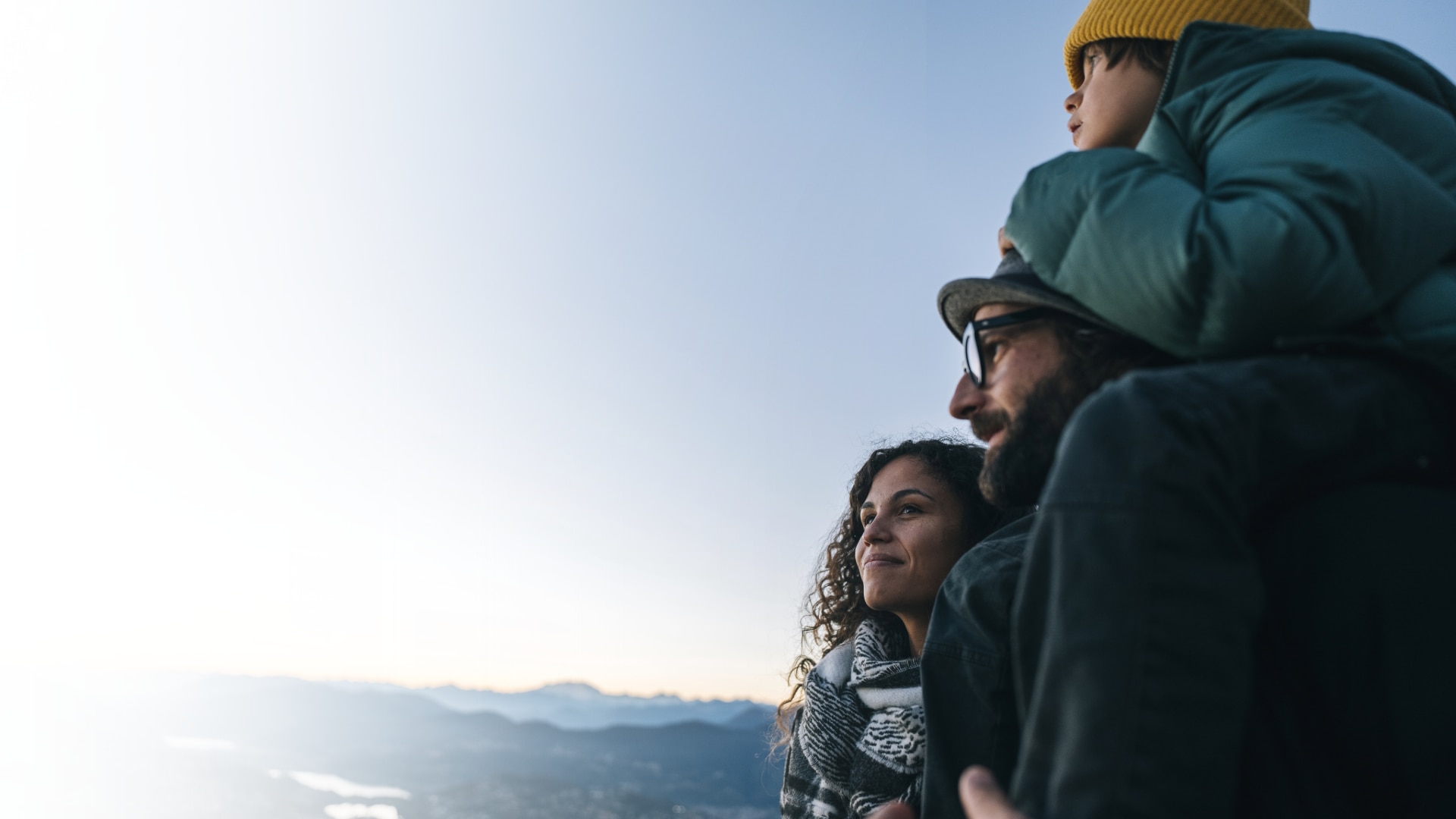 family looking out at the mountains