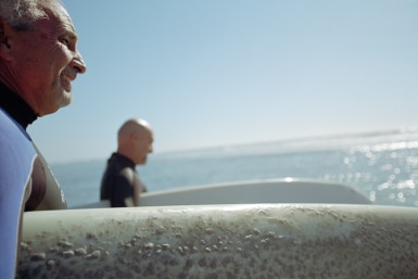 Two people going surfing