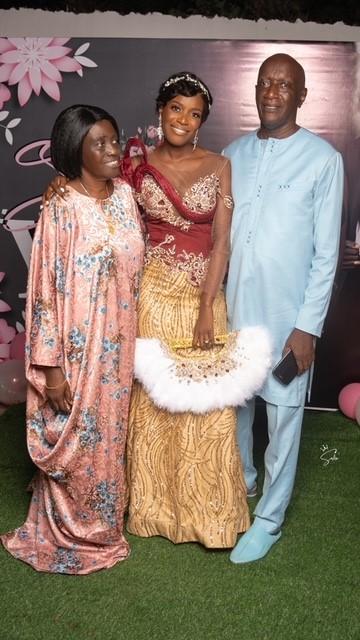 Harriet at an engagement party with her parents